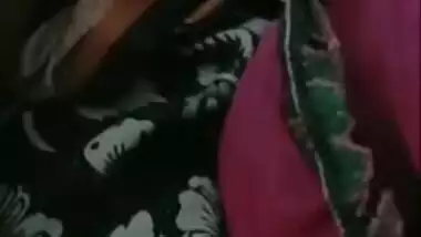 Aunty with perfect pussy lies in bed with legs wide open in XXX video
