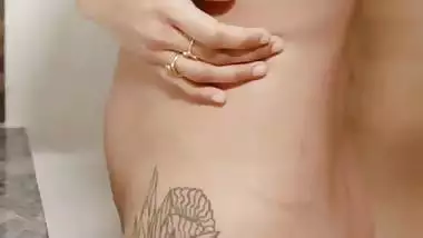 Kerala desi nude model stares at her naked body in a mirror