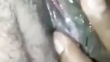 Indian woman flashes her juicy XXX tits and puts hand in sex panties