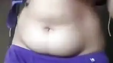 Indian girl takes colorful clothes off to bare hairy pussy for some porn